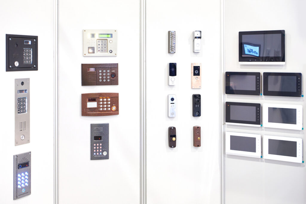 Showcase of various locks, keypads, and security system components on display