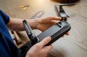 Technician assembling a smart lock mechanism for a door